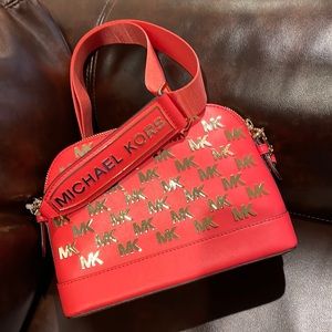 Pink and gold MK adjustable band